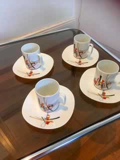 Lot de 4 tasses à café Limoges, décorées par Roch Popelier, vers 1960.